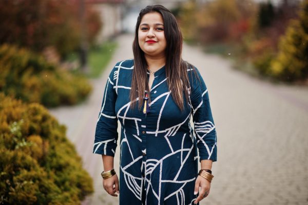 brunette-indian-woman-long-fashionable-dress-posed-outdoor